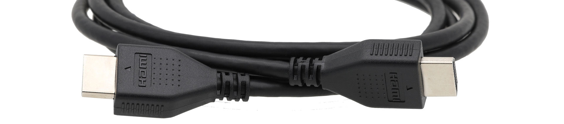 Close-up image of a black HDMI cable with two connectors, showing the durable design and detailed labeling on the connectors, coiled neatly on a white background.