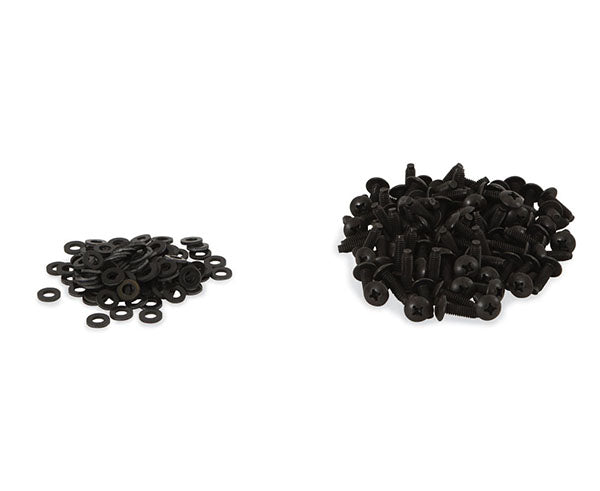 Assortment of black 10-32 rack washers and screws on a white background