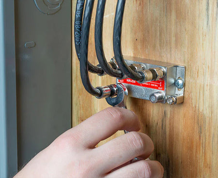 The 7/16" Ratcheting Stubby Speed Wrench being used on a connector