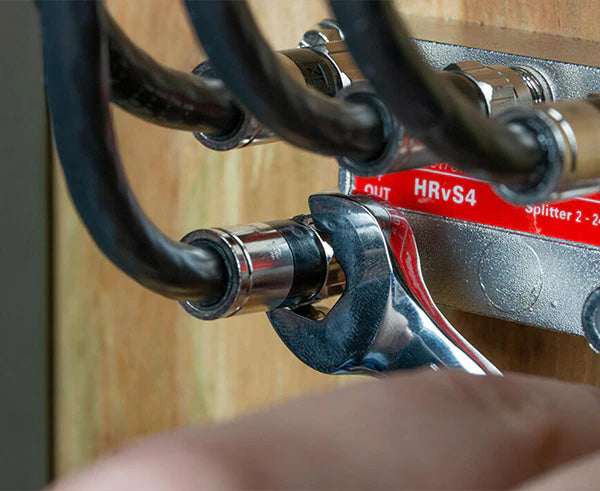 Action shot of a 7/16" Ratcheting Stubby Speed Wrench being used to tighten a fitting