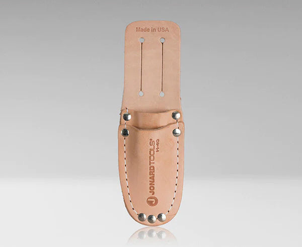 Leather sheath designed for splicing knife on white backdrop
