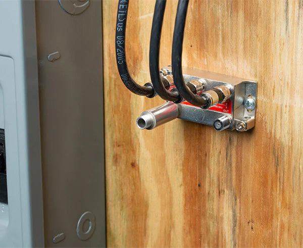 Detailed view of the 7" Terminator Tool's tip with wires and a metal box