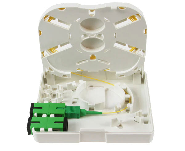 IP-45 rated indoor wall mount fiber termination box with open splice tray and fiber placement.