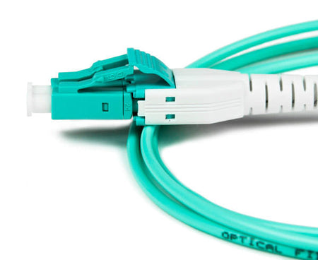 An OM3 uniboot LC duplex connector with aqua fiber.