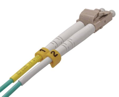 A single LC OM4 connector with beige body, dust caps and locking tab.