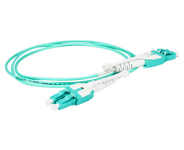 A coiled LC uniboot OM4 fiber patch cable with pull/push tab, dust caps, aqua body and fiber.