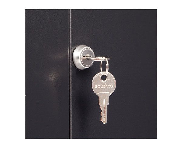 Key hanging from the lock of a LINIER solid door cabinet