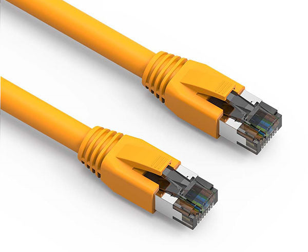 Close-up of a 5ft Cat8 40G shielded Ethernet patch cable in yellow