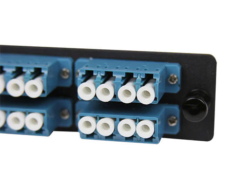 Close-up of LGX Adapter Plate with LC UPC quad couplers designed for single-mode fibers