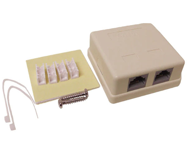 Top view of the almond 2-port CAT5E surface mount box with cable entry points