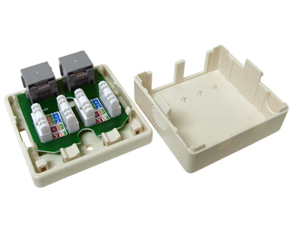 Angled view showing the dual ethernet ports on the almond surface mount box