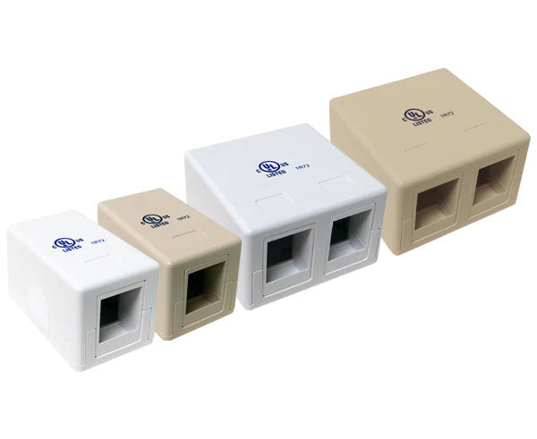 A collection of blank surface mount boxes in white and ivory with uniform branding