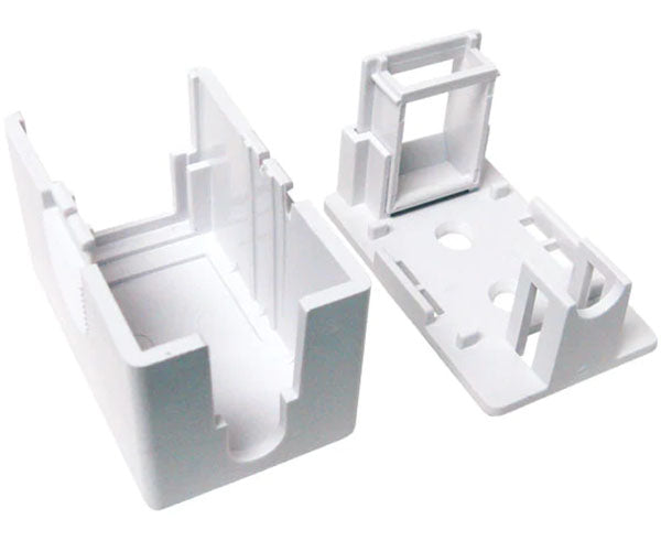 Two white blank surface mount boxes, each with a central knockout hole