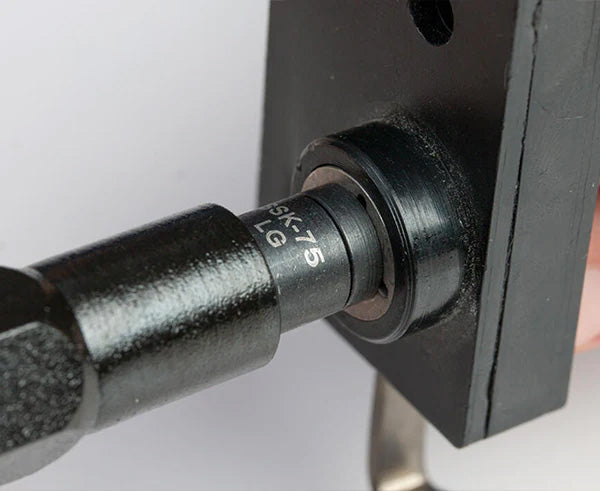 Close-up of the Star Key Can Wrench Kit being used on an LC pattern lock