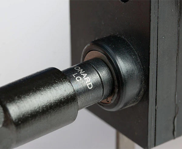 Detailed view of the Star Key Can Wrench's tip with a screw for adjustment
