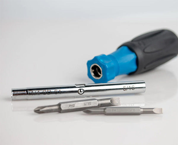 Screwdriver set from the Ultimate Backpack Fiber Prep Kit displayed on a clean surface