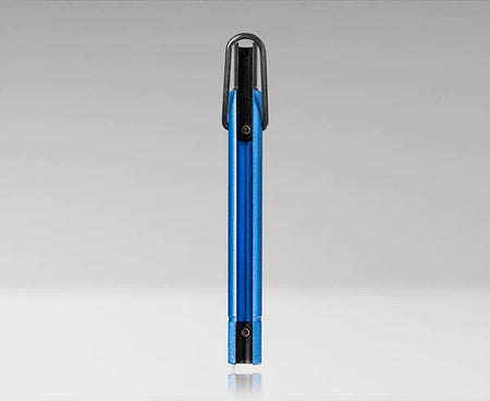 The Trap and Security Combo Tool with a blue body and black handle resting on a white surface