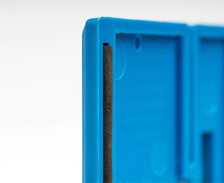Detailed view of the wall box template's level and grip handle