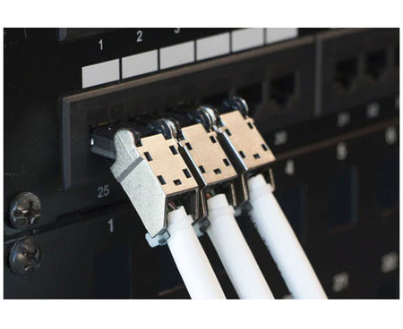 Three cat6a shielded RJ45 flex connectors installed in a patch panel.