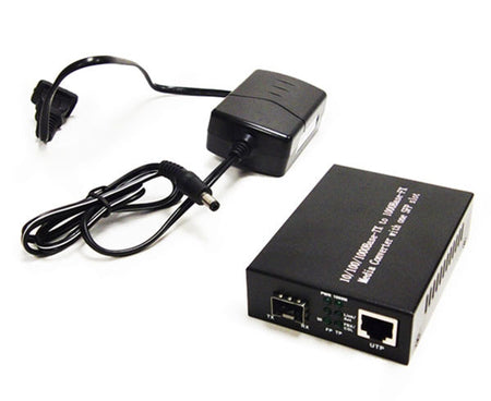 A 1000Base-FX SFP port to 1000Base-TX RJ-45 port optical media converter and power supply.