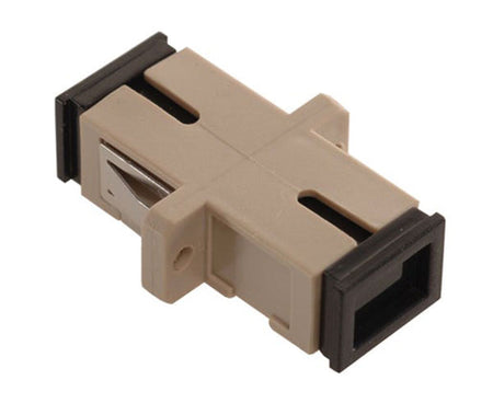 A beige simplex LC fiber optic adapter including plastic flanges and dust caps.