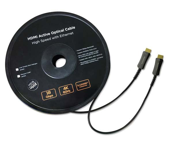 A fiber optic HDMI cable on a black plastic spool.