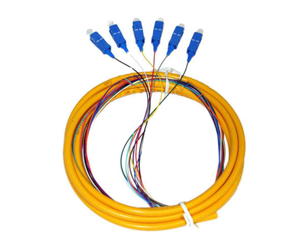 6 strand single-mode UPC SC fiber optic pigtail with yellow jacket.