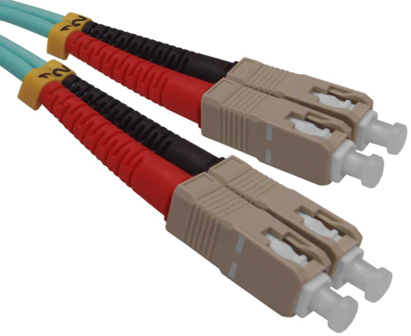 Four SC OM3 connectors on aqua fiber.