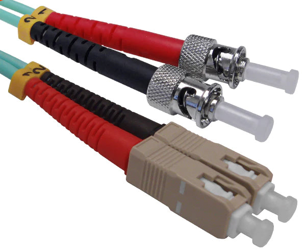  A pair of duplex SC OM3 connectors with beige body and a pair of ST OM3 connectors with metal body.