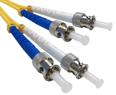 Four ST single-mode OS2 connectors on yellow fiber.