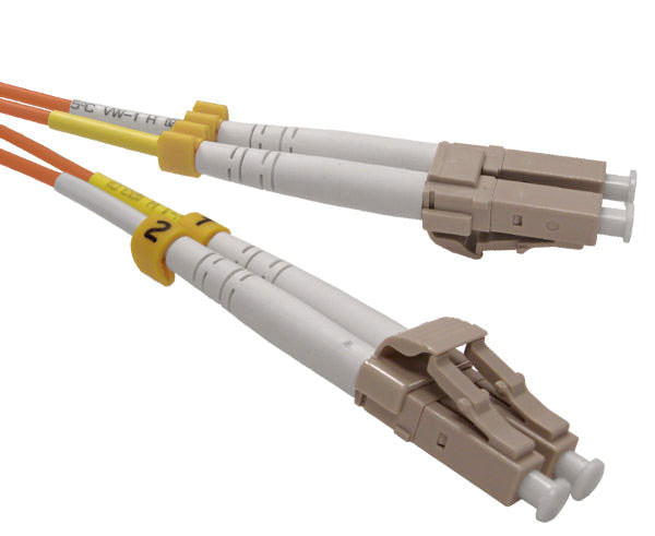 A pair of duplex LC UPC connectors with beige body and orange fiber.