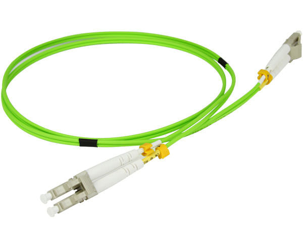 A coiled LC OM5 fiber patch cable with beige connectors, dust caps and lime green fiber.