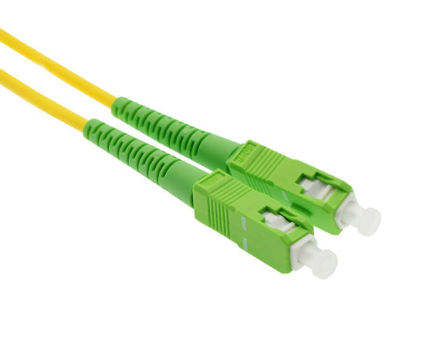 A pair of SC OS2 APC connectors with simplex yellow fiber, green body and dust caps.